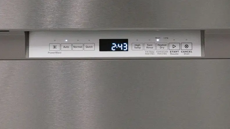 A close-up of the Maytag MDB4949SKZ dishwasher's front-facing control panel. The buttons, from left to right are: PowerBlast, Auto, Normal, Quick, High Temp, SSSani Rinse, Heated Dry, Start and Cancel. Each button has an LED indicator light over it and there's a digital display after the first four cycle buttons.