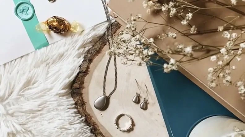 A necklace, earrings, and a ring