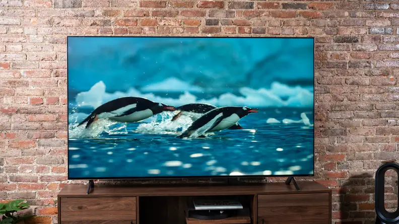 The LG QNED99 8K TV displaying 4K/HDR content in a living room setting