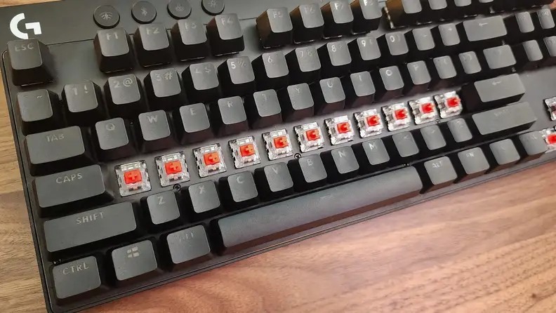 A close up of the Logitech G Pro keyboard, with keys missing on the keyboard.