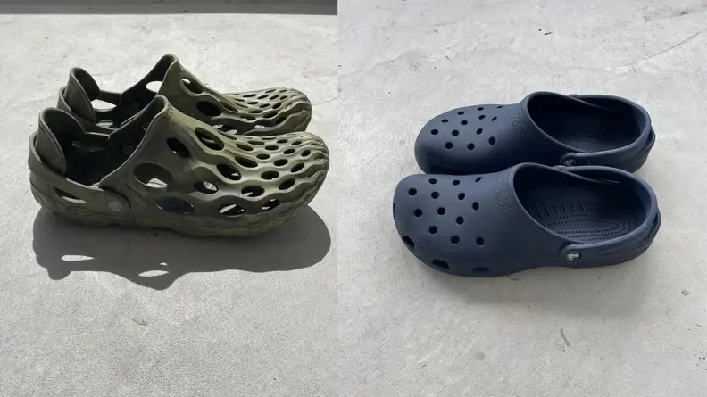 pair of green Hydro Mocs by Merrell, pair of navy blue Crocs Clogs