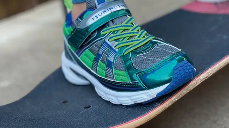Stylish shoes on a skateboard
