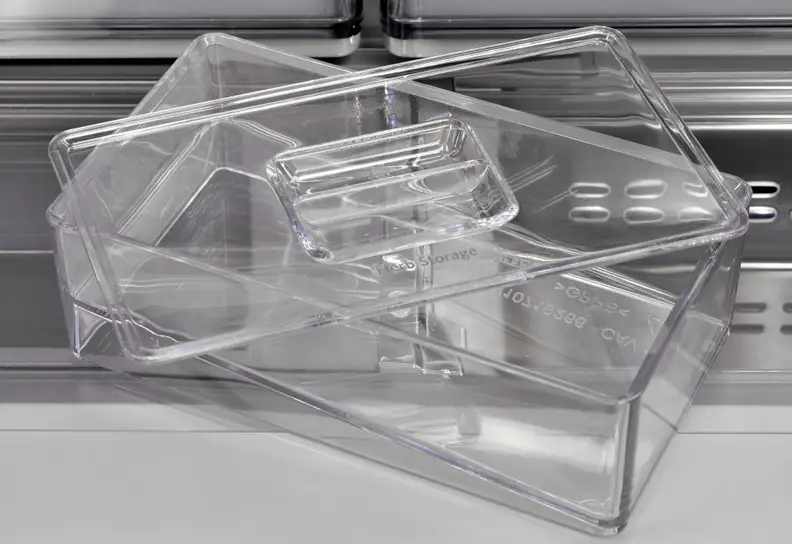 The KitchenAid KRMF706EBS's herb tray features a sloped interior. Stems can sit in a small pool of water while the leaves stay dry.