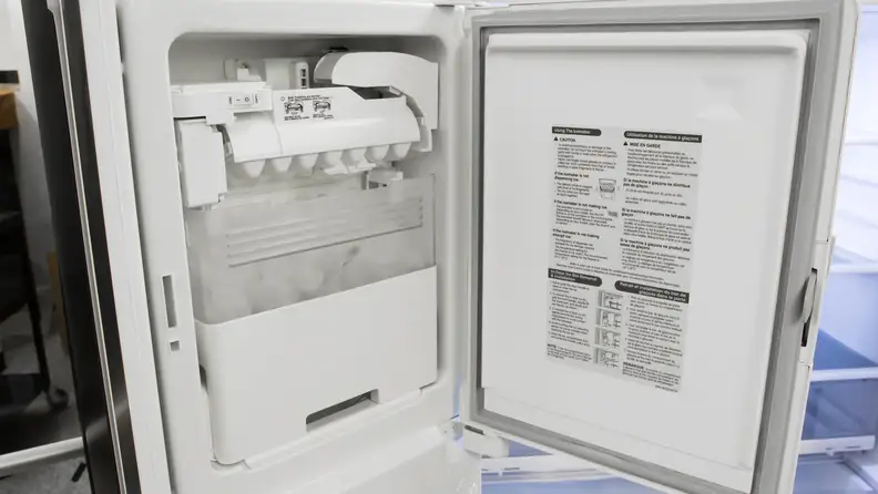 The slim icemaker is in the door on the left side