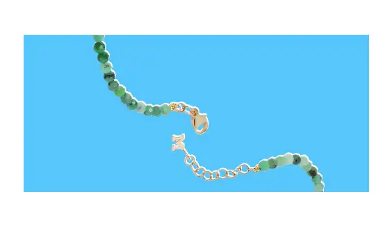 Close-up of a green necklace.