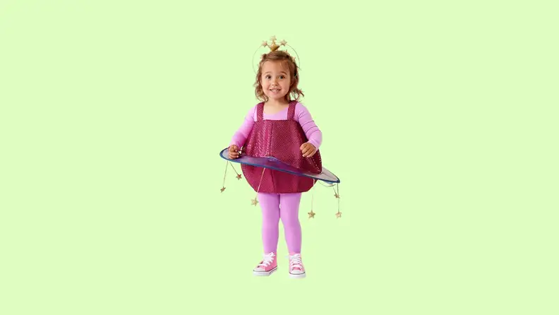 A child wearing a pink planet costume.