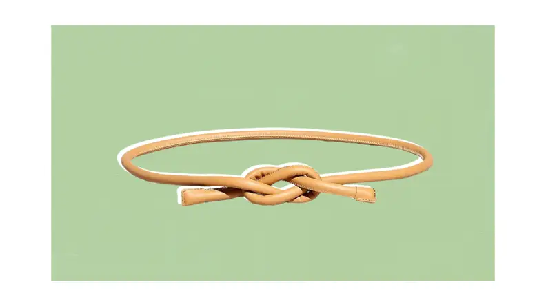 A simple tubular leather belt that ties to close.