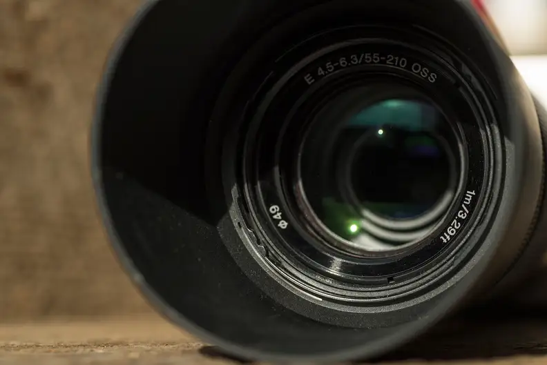 The included lens hood shields the front element from stray light.
