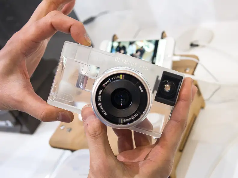 One 3D-printed prototype accessory at the Olympus booth was this camera-shaped case, complete with a functional shutter button.