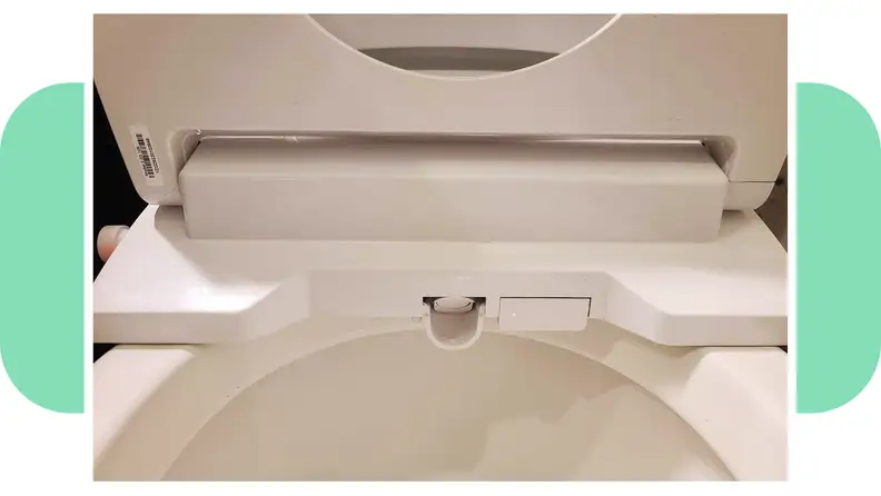 Close up shot of the Bio Bidet Discovery DLS smart seat attached to porcelain toilet.