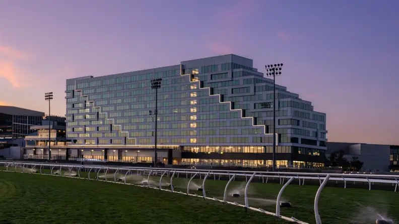 View of a casino resort at sunset