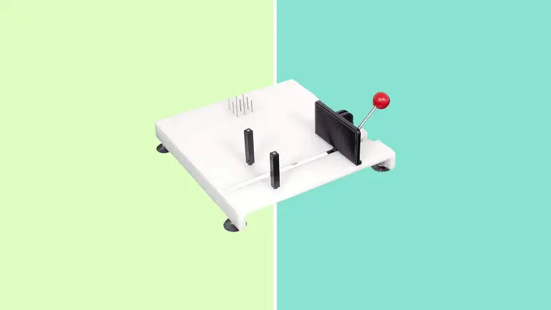 The Etac Cutting board in front of a background.