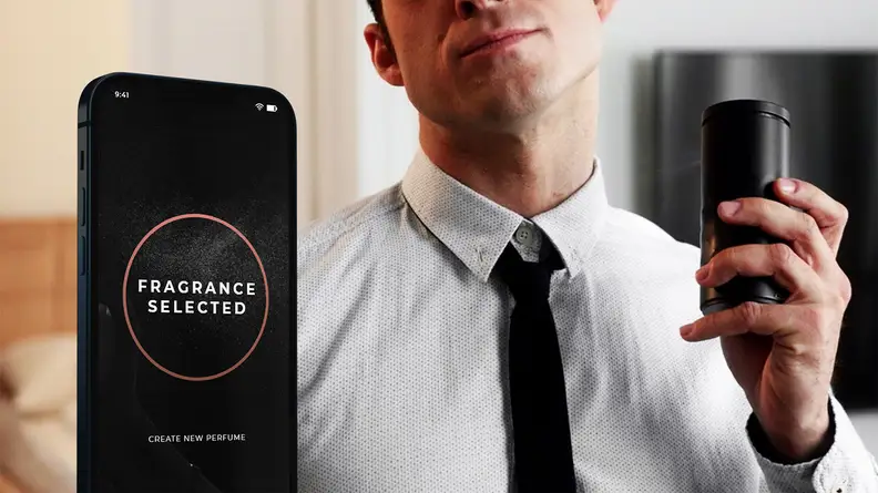 A man holding up a black canister of perfume to his neck and a smartphone screen pops up on the image to show that a perfume has been selected.