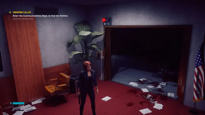 A woman standing in a disheveled office space
