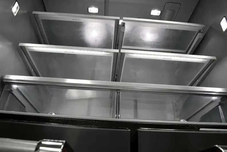 Each one of these shelves cuts into this KitchenAid's advertised storage.