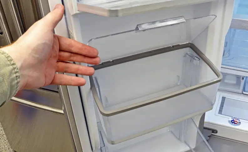 The Treasure Bin is an optional lid and liner that you can attach to the top of any regular door bin. Frankly, we don't see the point behind it.