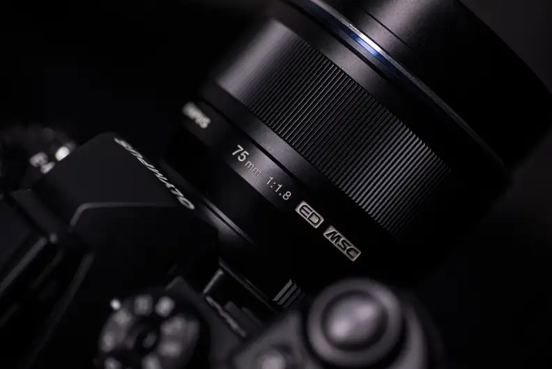 We prefer the black version of the 75mm f/1.8. Annoyingly, the silver finish doesn't match Olympus's own cameras.