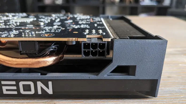 A close up of a desktop graphics card's power port.
