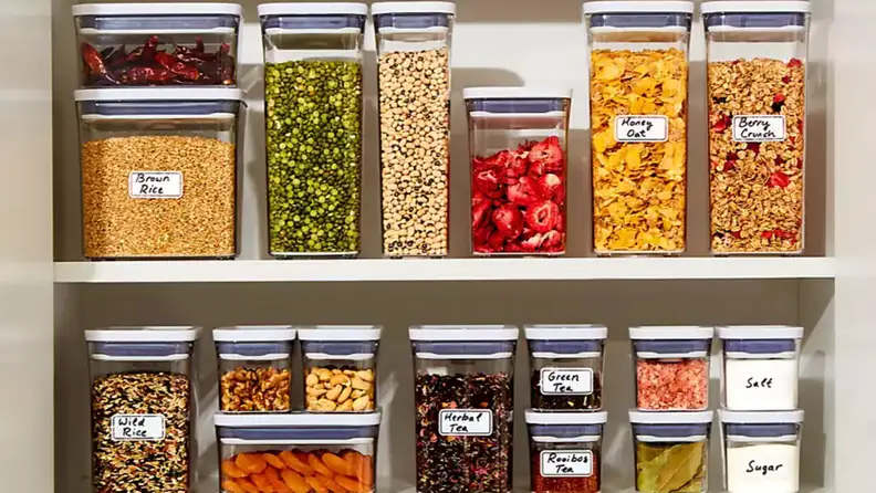Pantry filled with food organized with clear containers.