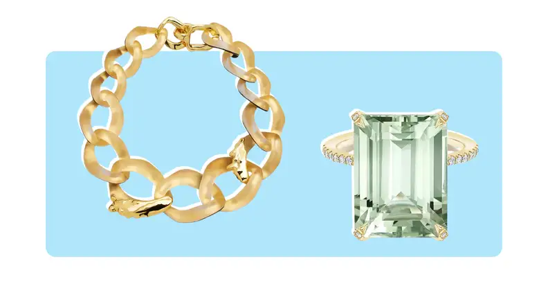 A gold ring with a large center gemstone and an oversized chain link necklace with gold accents.