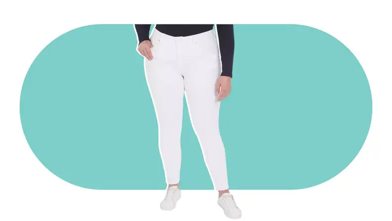 A model wearing the Lane Bryant Signature Fit Skinny Jean in white.