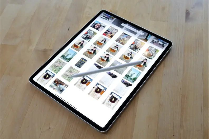 A photo of the 2021 iPad Pro with the photo library open.
