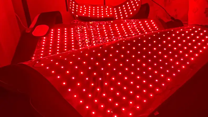 Bright red LED lights of Megelin laser & LED light therapy bag.