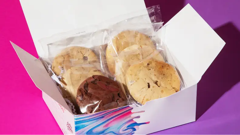 A box with six wrapped cookies from Dirty Cookie.