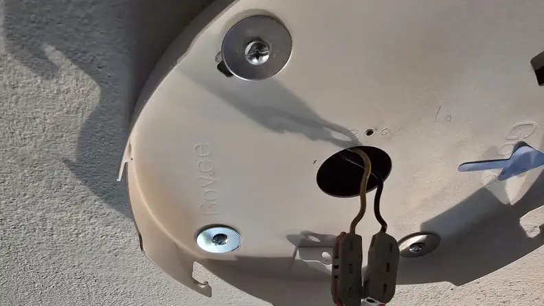 Installation of Govee Sky Ceiling Light showing interior parts.