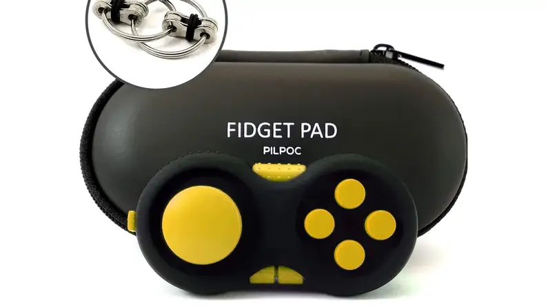A black and yellow handheld controller used for fidgeting.