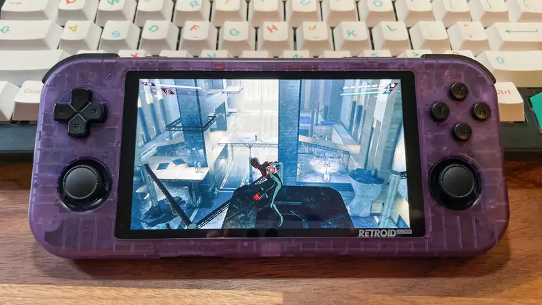 Looking at a gaming handheld, the retroid pocket 3+ streaming Spider-Man: Miles Morales