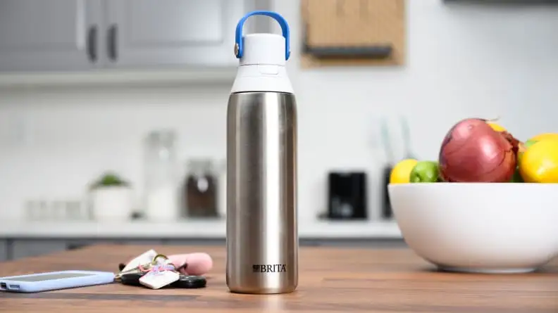 A steel water bottle on a counter