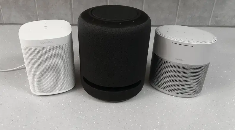 Sonos One, Echo Studio, and Bose Home Speaker 300 on counter
