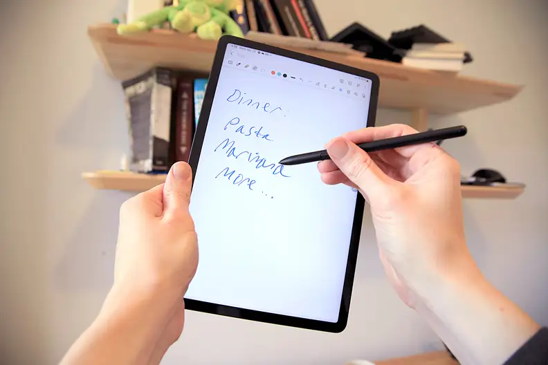 The Samsung Galaxy Tab S8 used with the S Pen to take notes