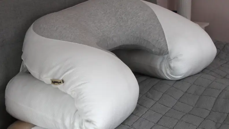 The Hugl body pillow folded up so it can be used for sitting upright.