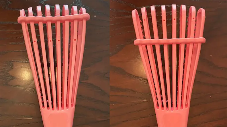 A photo of the clip on the back of the EZ Detangler Brush.