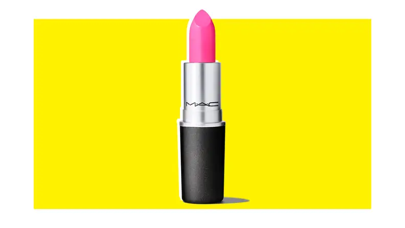 Tube of MAC Matte lipstick in “Candy Yum Yum” shade that is hot pink.