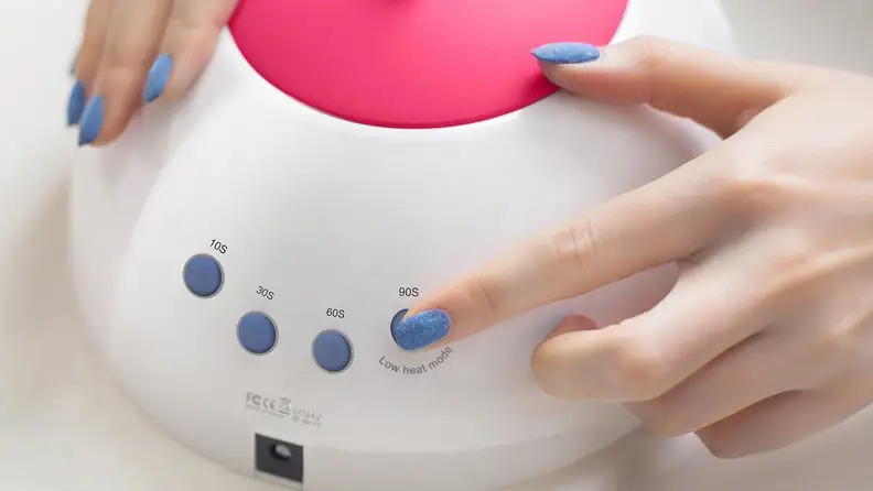 Timer buttons on the back of the SunUV nail lamp