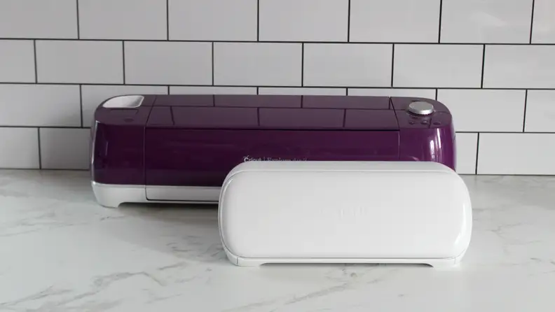 The Cricut Joy Xtra next to the Cricut Explore Air 2 for comparison.