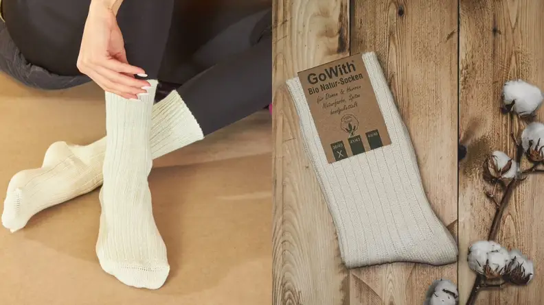 Pair of natural cotton socks from Etsy seller GoWith being worn by a woman, pair of GoWith cotton socks in packaging.