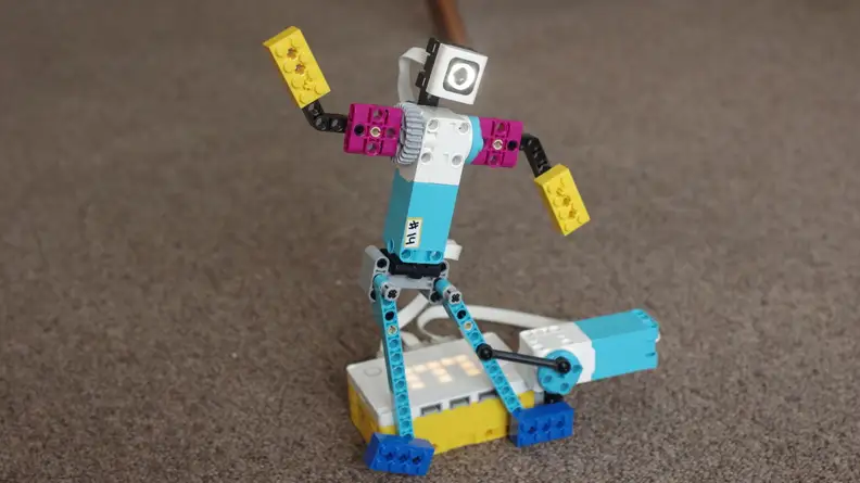 Who wouldn't want to build a LEGO break dancer? The challenge: code the robot's movements so that they are in time to the beat!