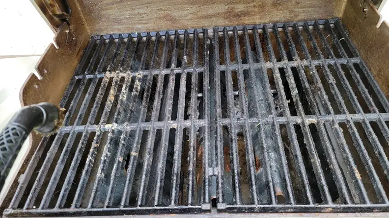 A grease-covered grill
