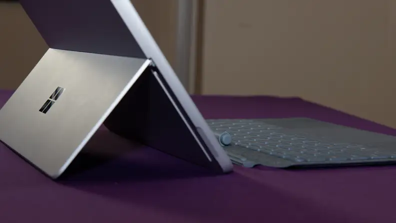 Laptop on a table, with kickstand engaged