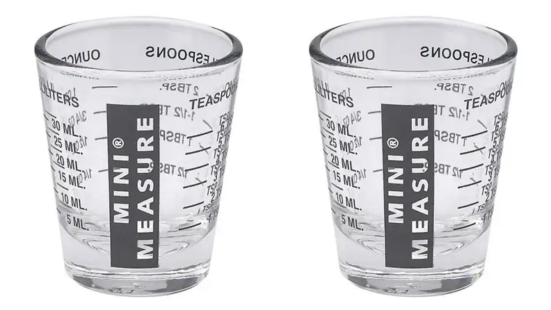 It may look like a shot glass, but it's a tiny measuring cup.