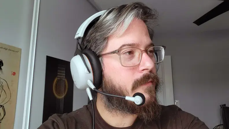 A man wearing the Beyerdynamic MMX 150
