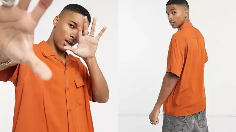 man wearing vintage-inspired rusty orange camp collar shirt from ASOS