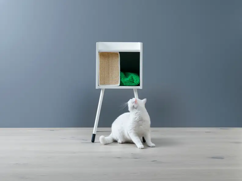 A hybrid nightstand and cat home