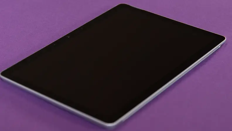 The laptop tablet lies alone on the table