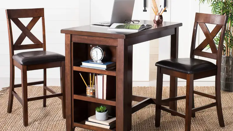 Wooden table that looks like desk with two chairs.