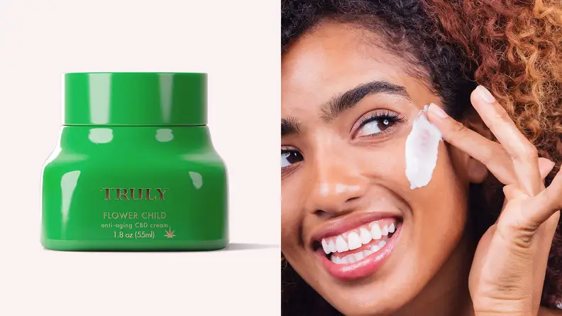 On the left: The green tub of the Flower Child CBD Face Cream sitting on a light pink background. On the right: A woman smiles and looks off into the distance while applying a thick amount of moisturizer to her cheek.